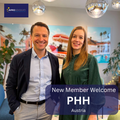 Image of 2 new members with AVrio branding